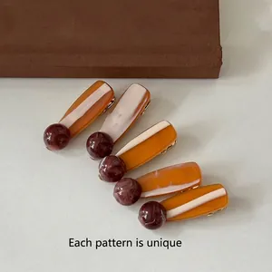 Set of 5 minimalist duckbill hair clips with amber and ivory ink smudge marble patterns