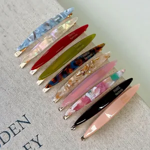 Elegant willow leaf acetate hair clips set with marbled patterns and gold metal base