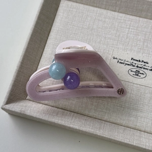 Pale purple jelly resin hair claw clip with glitter finish and blue spherical beads
