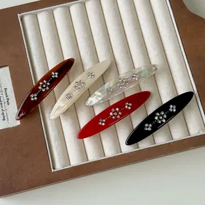 Five-piece set of elegant rhinestone flower duckbill hair clips in assorted retro colors