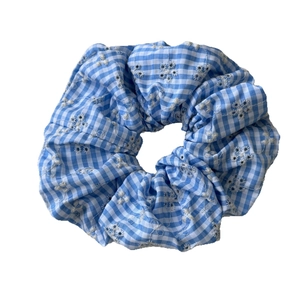Blue and white plaid scrunchie with white flower embroidery in minimalist cottagecore style