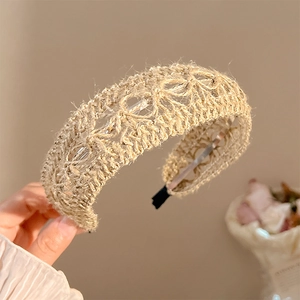Bohemian hand-woven linen headband with hollow geometric pattern in natural khaki color