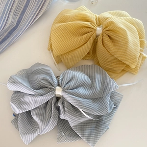 Extra large gingham bow hair clips in yellow and blue colors with crystal pendants