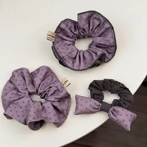 Ensemble de trois chouchous élégants en jacquard gris-violet avec motif nœud pour femmes