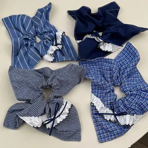 Set of four French blue plaid scrunchies with lace trim and elegant bow accents