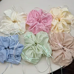 Set of six pastel satin hair scrunchies with long ribbons in French ballet style