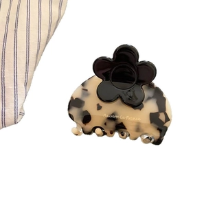 French style tortoise shell acetate hair claw with a 3D black flower decoration