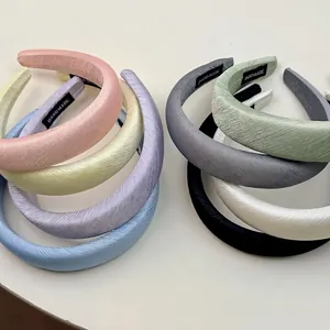 Handmade textured fabric headbands in assorted candy colors for a high-volume hair look