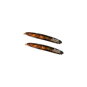 Elegant tortoiseshell acetate hair clips for women in a minimalist barrette style