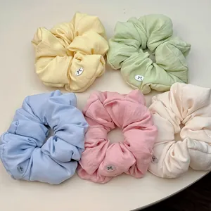 5er-Set Pastell Haargummis in Gelb Grün Blau Rosa und Weiß im weichen Bubble-Stil