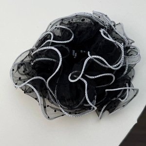 Polka dot mesh hair scrunchie with white woven edge for elegant messy bun styling