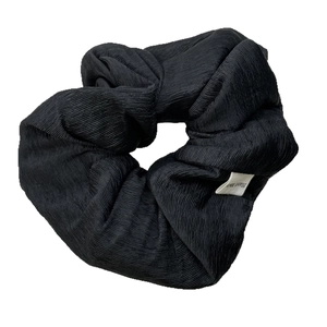 Handmade black oversized scrunchie with vertical textured fabric for high ponytail