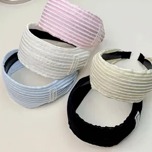 Serre-têtes larges antidérapants pour femmes en plusieurs couleurs avec tissu rayé