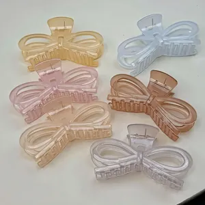 Jelly color bow hair claws in pastel shades for elegant styling and versatile hair buns