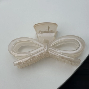 Jelly champagne bow hair claw clip for women's elegant updo styling minimalist look