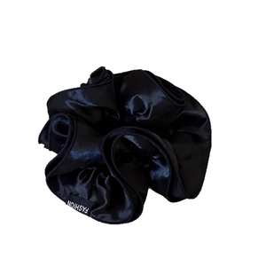 Elegant large double-layer black satin scrunchie with fashion label for hair styling