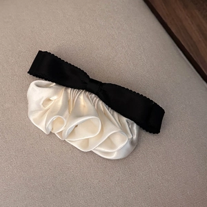 Elegant French style bow hair clip with black ribbon and cream pleated satin details