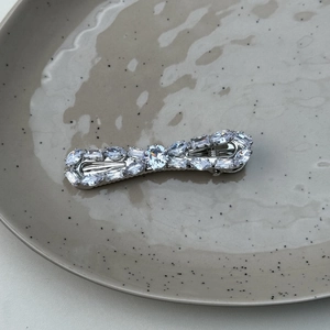 Exquisite silver bow hair clip with full marquise and round zircon crystal embellishments