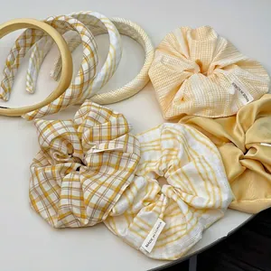 Ensemble chouchou en tissu à carreaux jaune et blanc et serre-tête rembourré