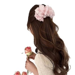 Elegant large pink ruffled organza scrunchie hair clip with multi-layer fluffy design