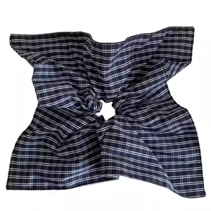 Classic American collegiate plaid fabric scrunchie with soft texture and navy white pattern