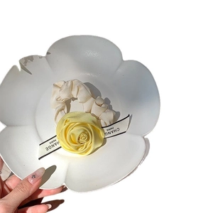 Elegant handmade off-white fabric hair scrunchie with yellow 3D rose and ribbon