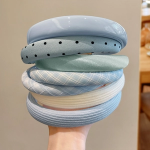 Padded polka dot and satin headbands set in assorted blue tones for a high volume look