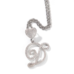 Hip hop silver tone necklace featuring heart clasp and large iced out letter D pendant