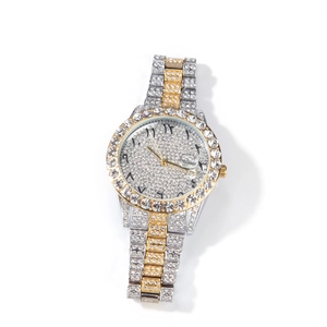Luxury iced-out quartz watch with gold-tone accents and Eastern Arabic numerals dial