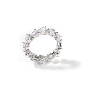 Hip hop style silver eternity ring featuring a row of pear-cut cubic zirconia stones