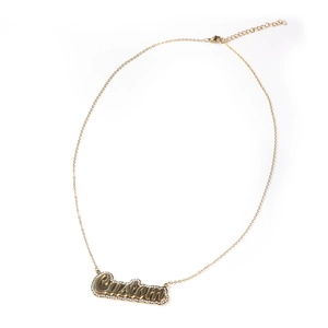 Close-up of gold custom name necklace with sparkling cubic zirconia on an O-chain