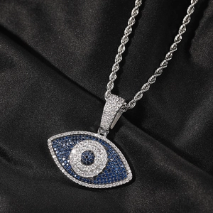 Collier hip hop œil bleu avec cristaux et chaîne torsadée argentée brillante