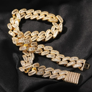 Close-up of gold-plated 15mm Cuban link chain with meticulously hand-set cubic zirconia