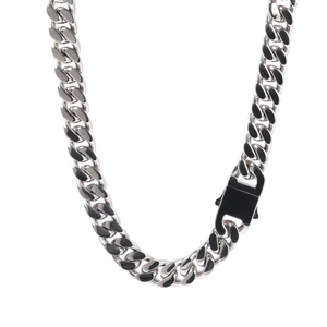 Detail view of 12mm stainless steel Cuban link chain with industrial buckle clasp