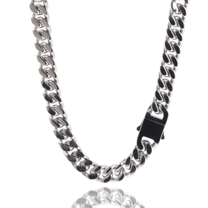 Detail of 12mm stainless steel Cuban chain with industrial style black spring buckle