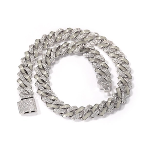 Detail of 13mm silver Cuban link chain with pave zircons and enamel inlay for men