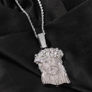 Close-up of hip hop Jesus pendant with silver rope chain and white zircon inlay