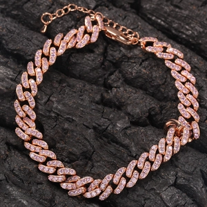 Detail of rose gold Cuban link anklet with pink zircons and lobster clasp closure