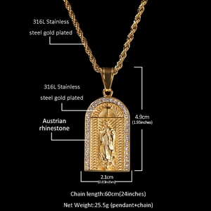 Detailed view of Virgin Mary pendant with white rhinestones on golden twist chain