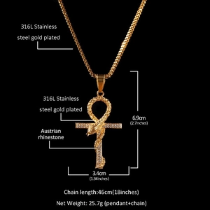 Detail view of 316L gold plated Ankh cross pendant with snake wrap and cubic zirconia