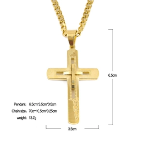 Macro detail of gold plated stainless steel cross pendant with 6.5cm x 3.5cm dimensions