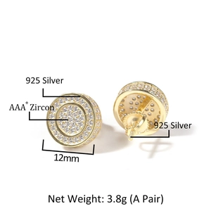 Macro detail of 925 silver round stud earrings with AAA+ cubic zirconia and gold finish