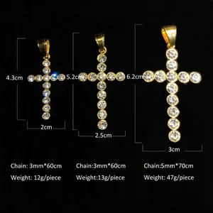Detailed size comparison of three gold plated hip hop cross pendants on black background