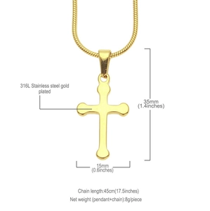 Detail view of gold-plated 316L stainless steel cross pendant with 35x15mm dimensions