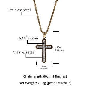 Detailed view of gold plated stainless steel cross pendant with AAA+ cubic zirconia