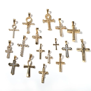 Golden stainless steel cross and Ankh religious pendants set in various textures