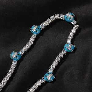 Cadena tennis hip hop de plata con colgantes de monstruos azules y cristales brillantes