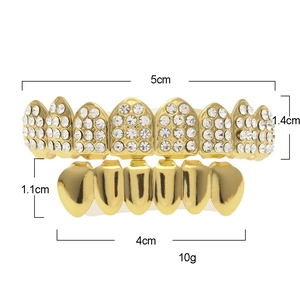 Detailed size chart of gold hip hop teeth grills with dimensions 5cm and 4cm width