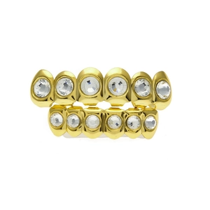 Detailed view of hip hop gold plated teeth grillz set with sparkling rhinestones