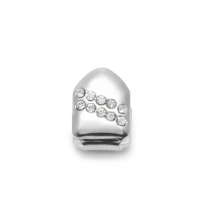 Macro detail of silver single tooth grill with dual rows of sparkling crystals